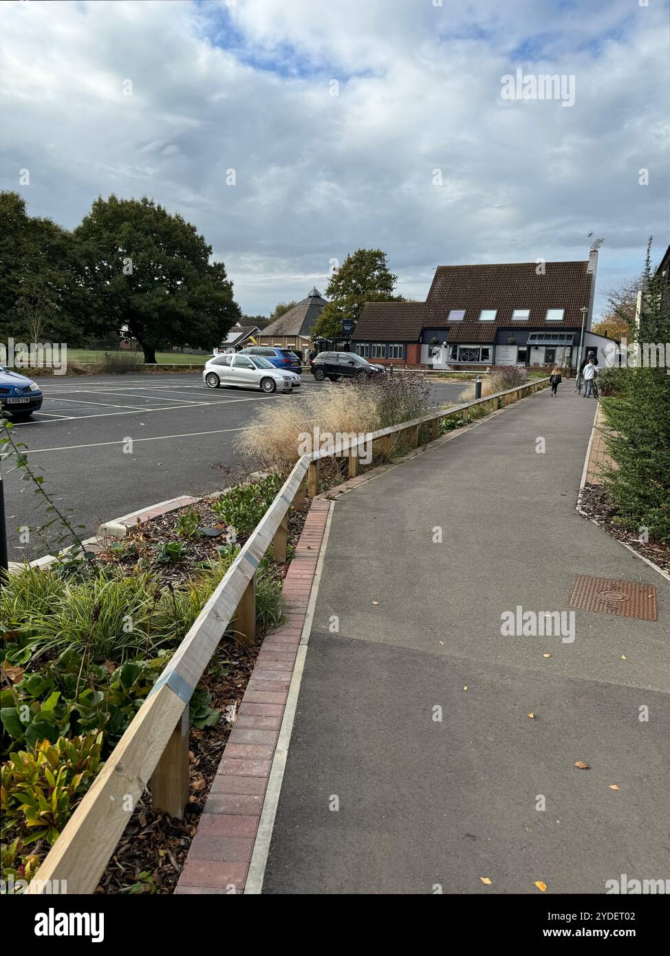 Martlesham Heath, Suffolk - 26 October 2024 : Footpath from McCarthy Stone Squadron House to the Douglas Bader pub restaurant - Smartphone Captured Stock Image