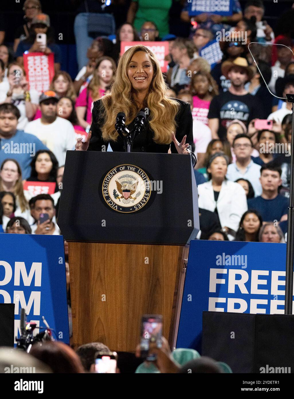 Beyonce onstage during a campaign event at Shell Energy Stadium on ...