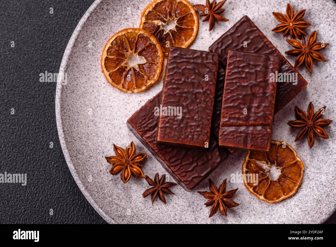 Rectangular chocolate candies with mousse and waffles Stock Photo - Alamy
