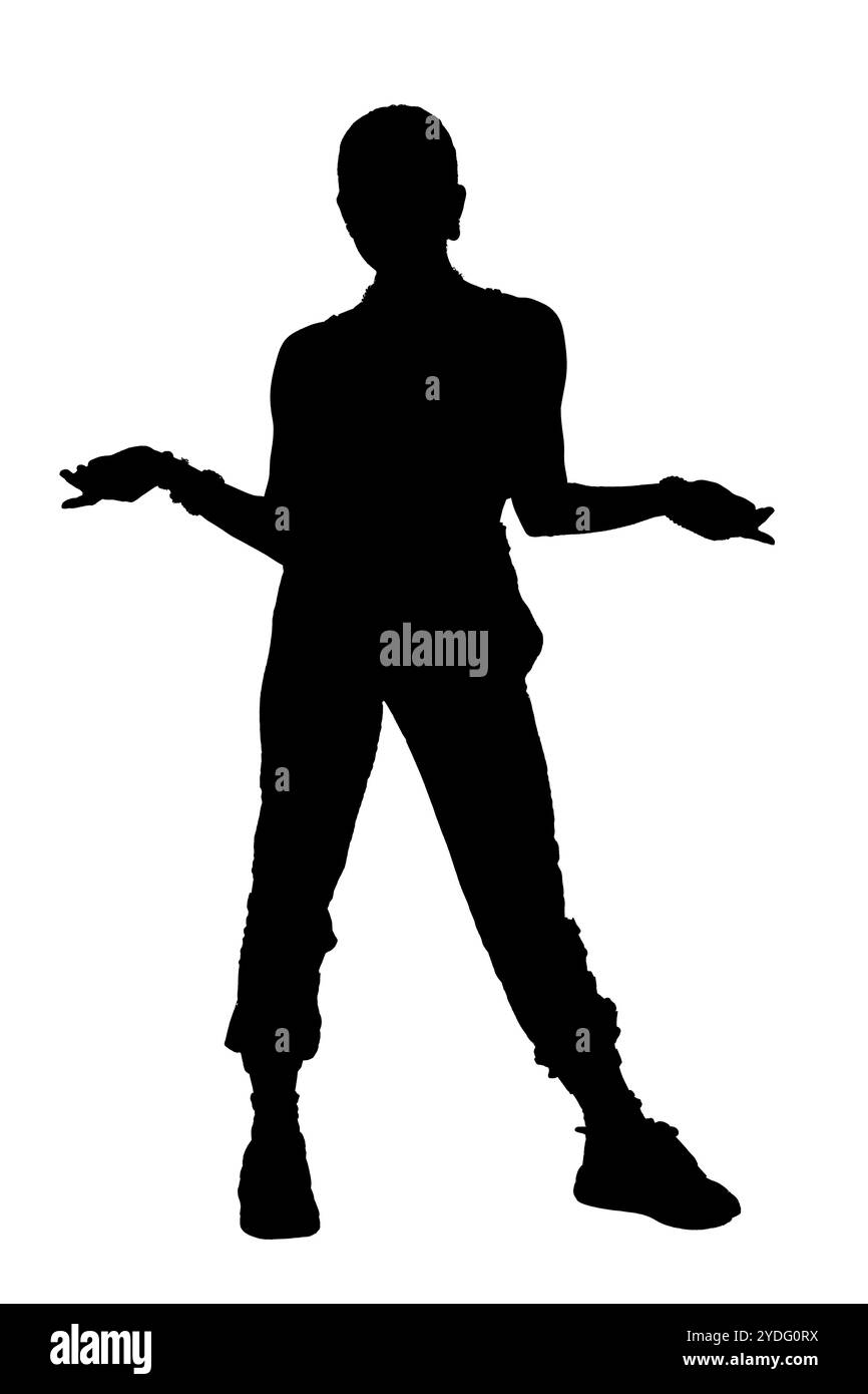 A dark silhouette of a man standing tall with his arms outstretched ...