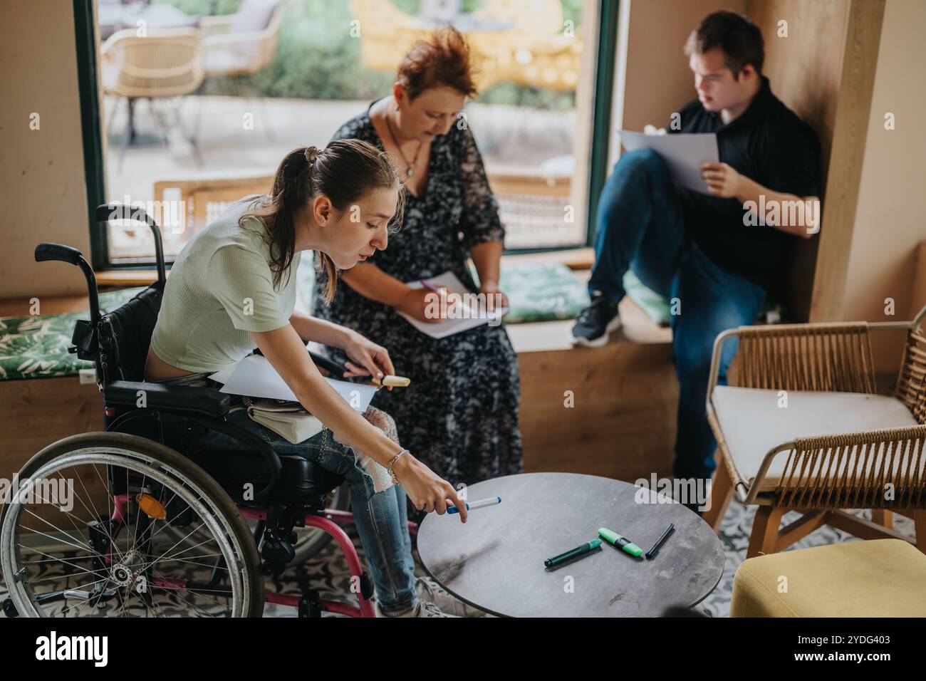 Inclusive group engaging in a collaborative work session indoors Stock Photo