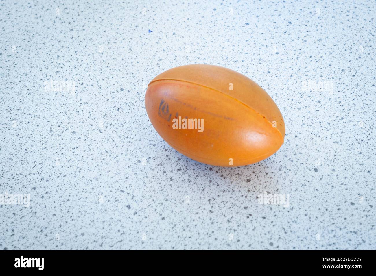 Stress ball in the shape of a rugby ball Stock Photo - Alamy