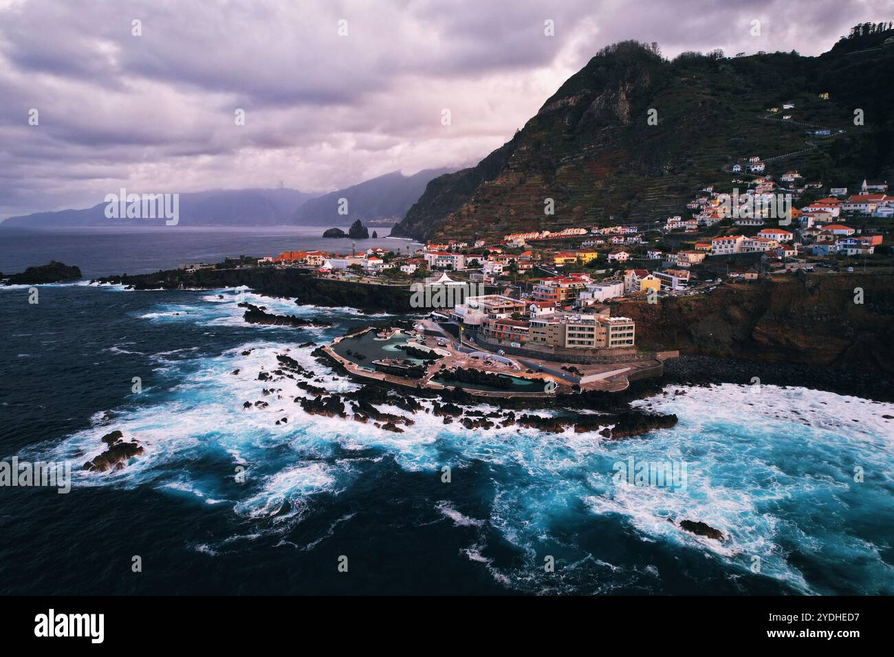 Aerial view of Porto Moniz with volcanic lava natural swimming pools ...