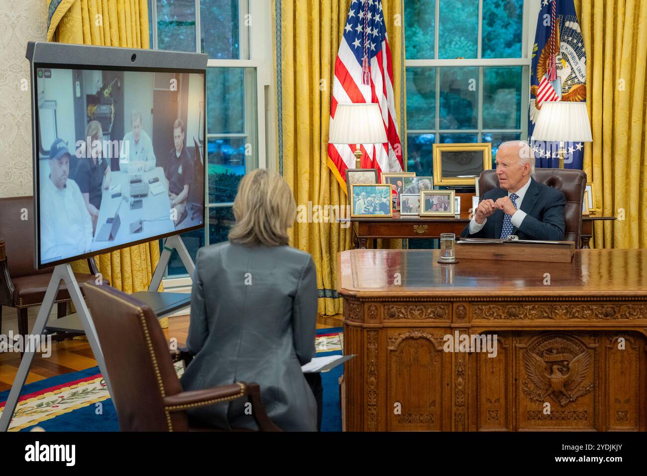 President Joe Biden talk with FEMA Administrato Deanne Criswell and North Carolina Gov. Roy Cooper (D)  and receives  an update on damage from Hurricane Helene , Monday, September 30, 2024, Oval Office of the White House. (Official White House Photo by Adam Schultz) Stock Photo