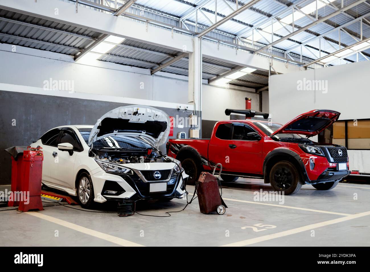 Car Maintenance Technician Working on Engine Stock Photo - Alamy