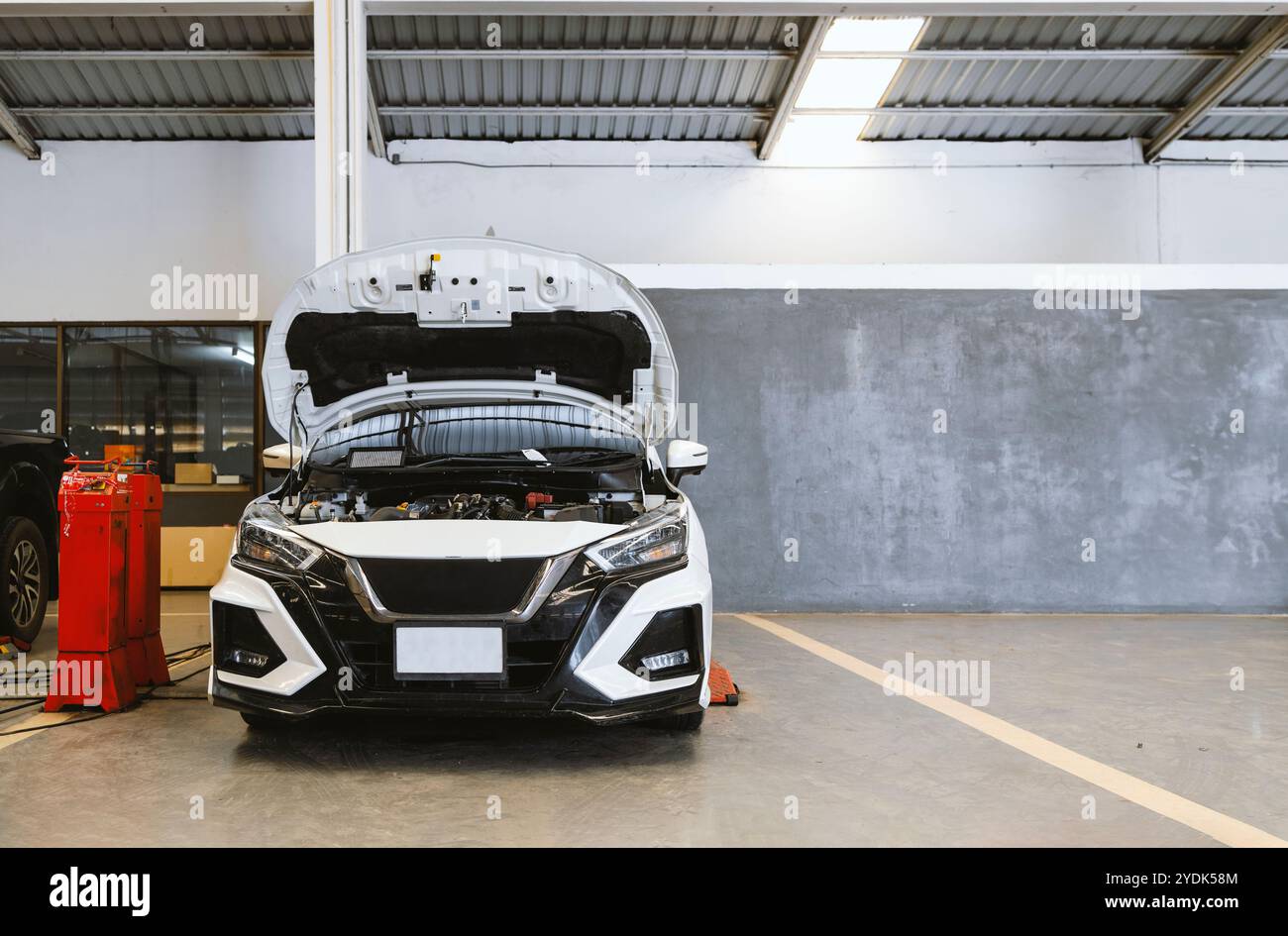 Car Maintenance Technician Working on Engine Stock Photo - Alamy