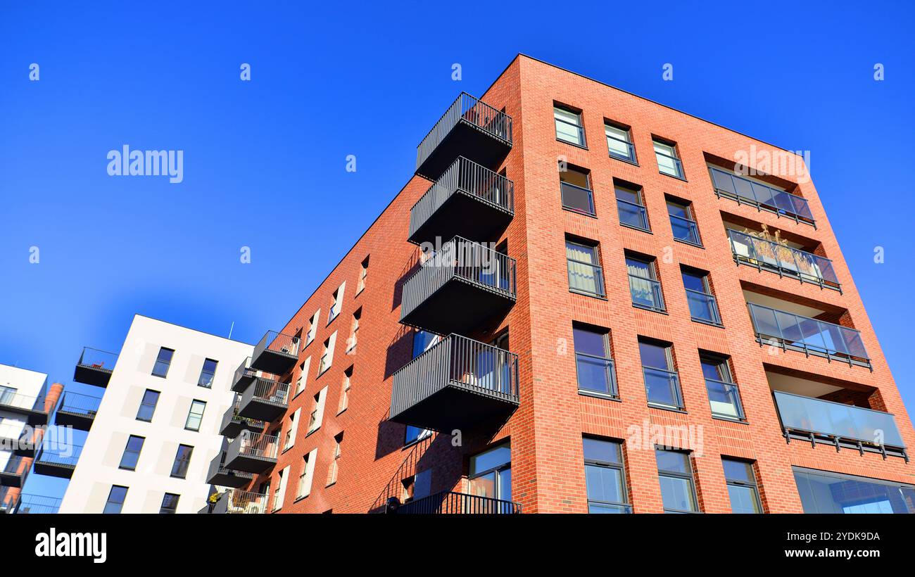 Modern multifamily building in a european city. Walls made of concrete ... - High-Rise Multifamily Building Design Luxury Finishes