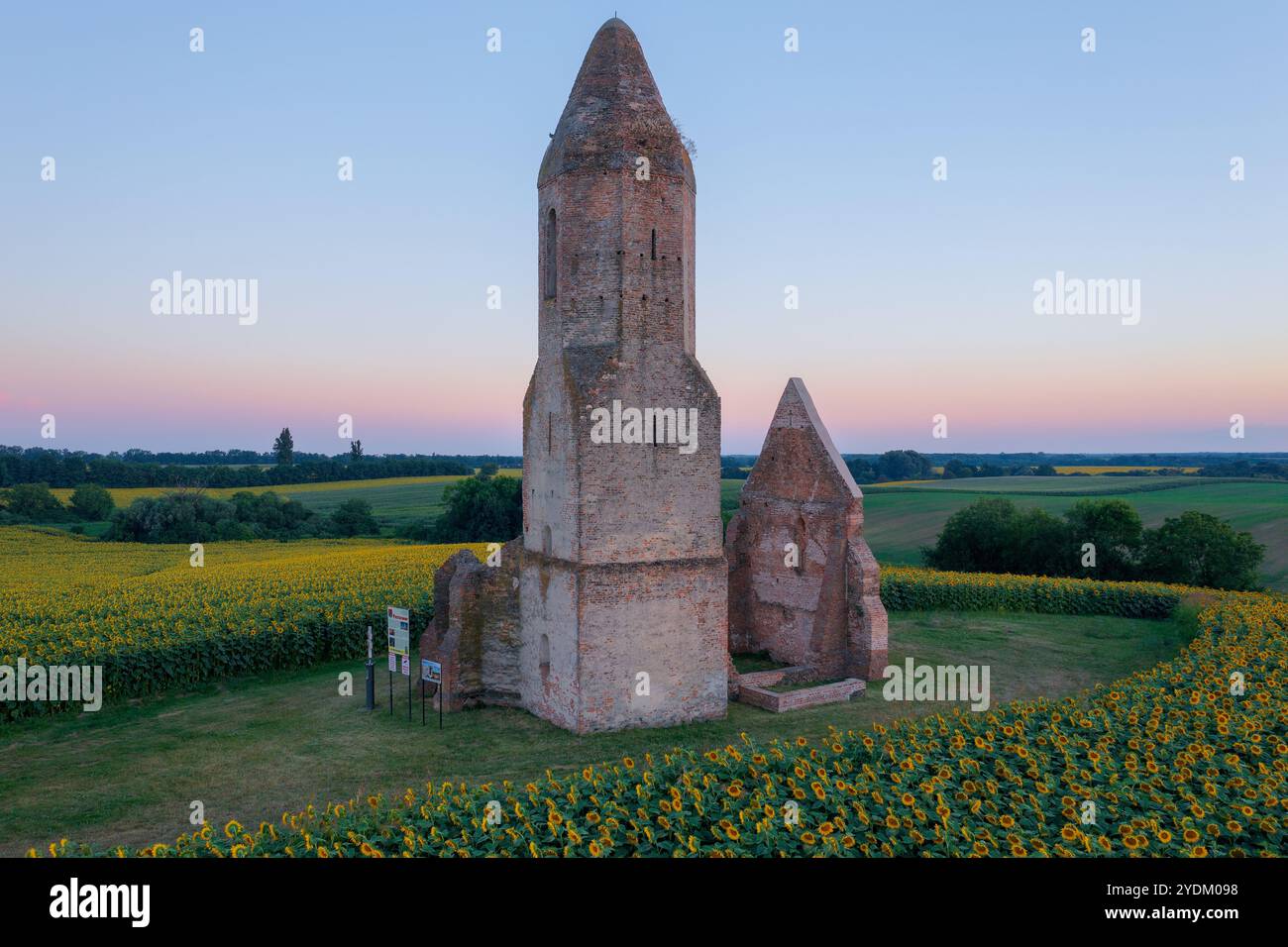 Somogyvamos, Hungary - Aerial view about abandoned church ruin called Pusztatorony in the middle of an agricultural field. Stock Photo