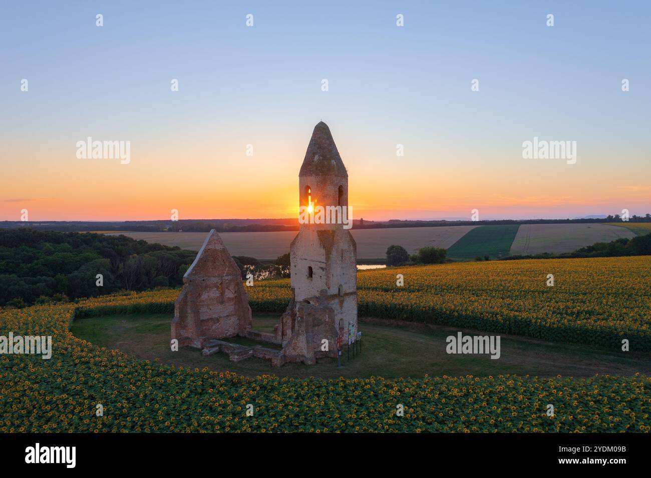 Somogyvamos, Hungary - Aerial view about abandoned church ruin called Pusztatorony in the middle of an agricultural field. Stock Photo