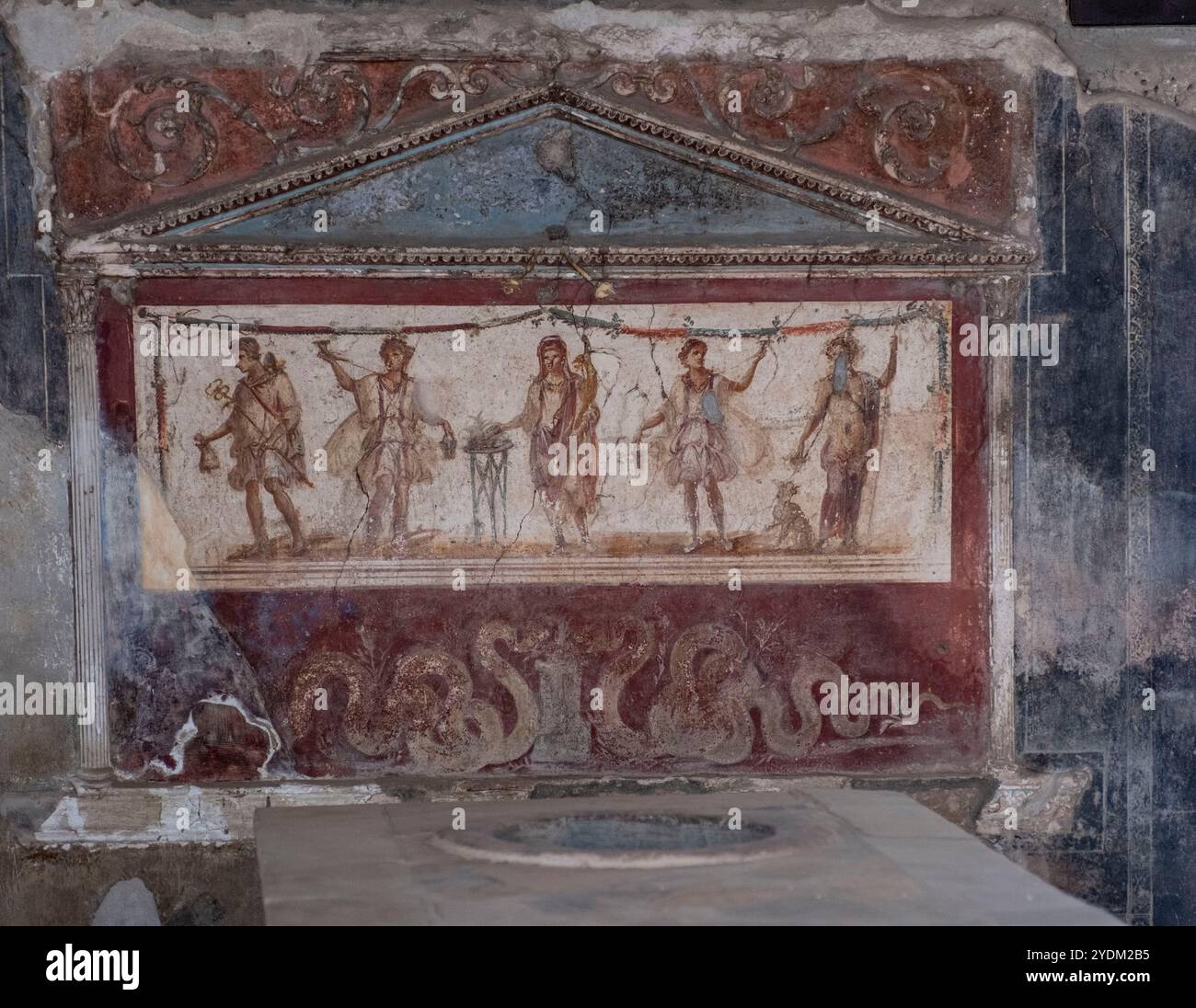 Wall fresco in the Ancient Roman Street Food Kitchen Thermopolium asellina,  Pompeii, Naples, Italy. Stock Photo