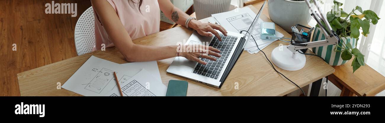 Designing Interface Layout on Laptop at Office Desk Stock Photo - Alamy