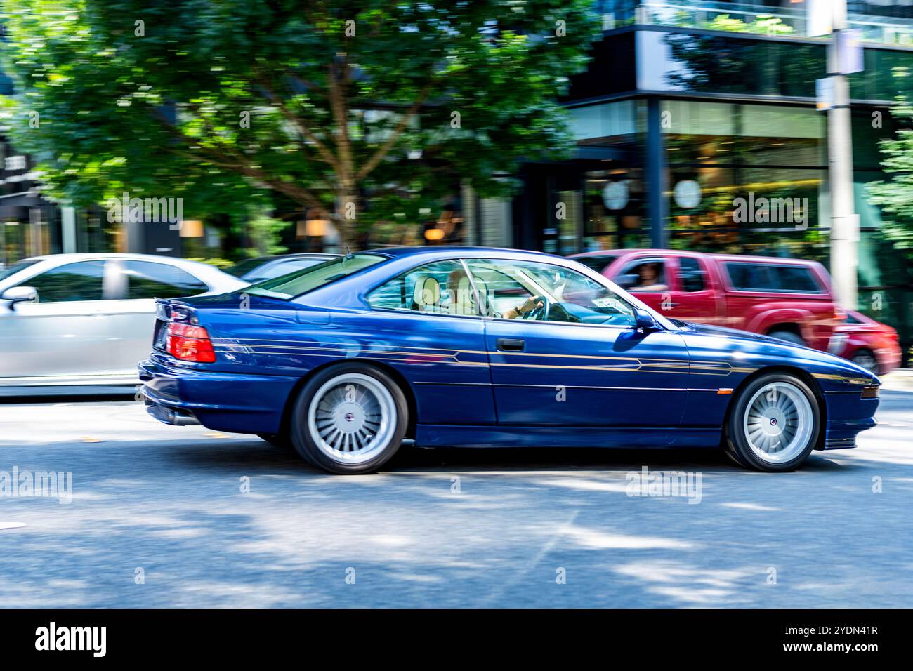Seattle, WA, USA -July 29, 2024: BMW 850i Alpina blue with a V12 and 6 ...