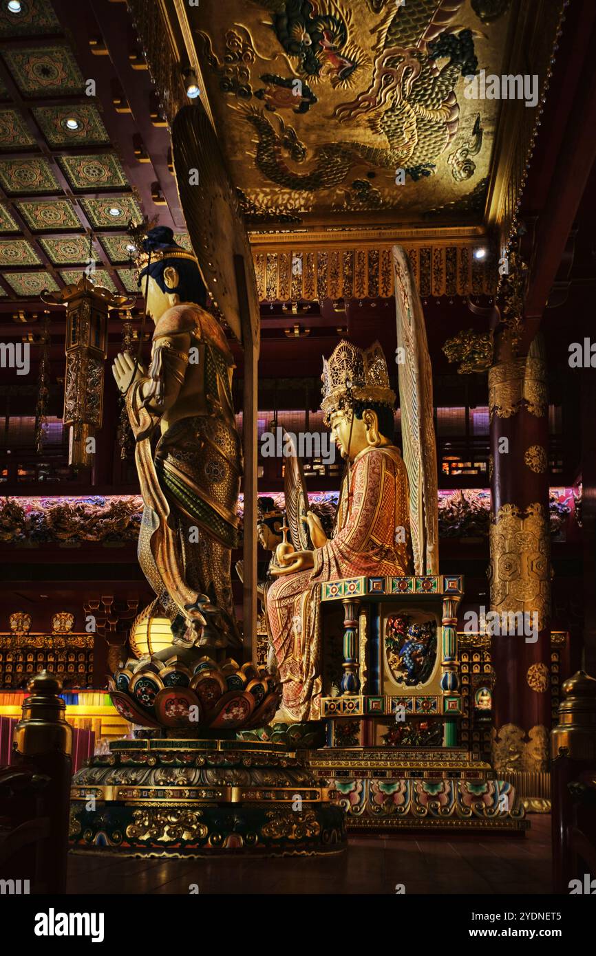 Singapore - August 16, 2024: Buddha Tooth Relic Temple, Chinatown, ornate gold interior, religious cultural landmark destination Stock Photo