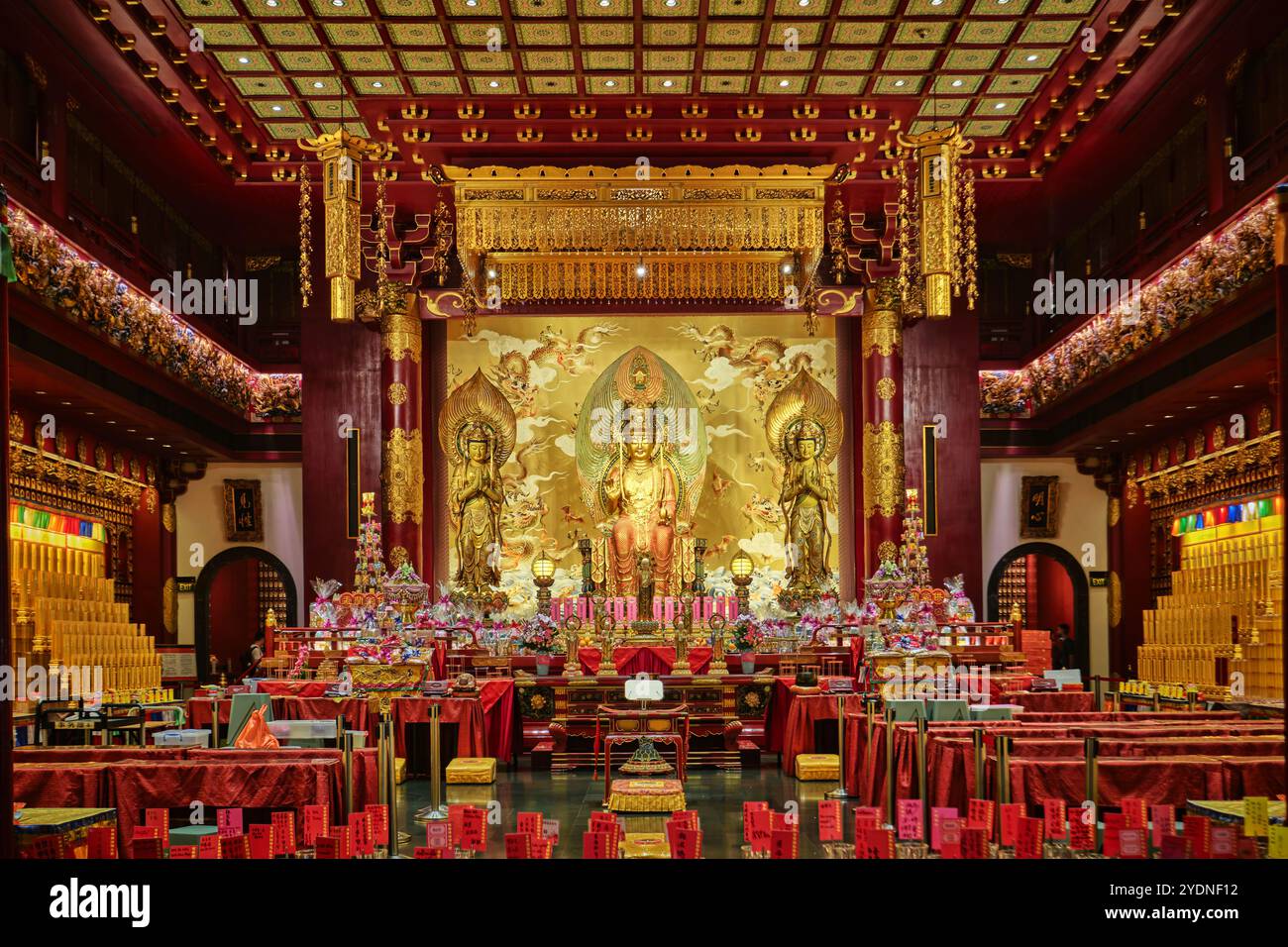 Singapore - August 16, 2024: Buddha Tooth Relic Temple, Chinatown, ornate gold interior, religious cultural landmark destination Stock Photo