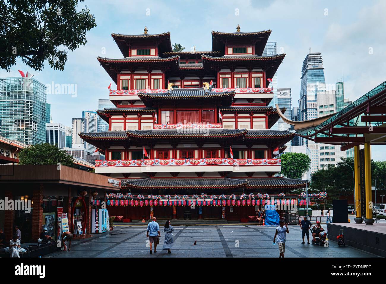 Singapore - August 16, 2024: Buddha Tooth Relic Temple, Chinatown, ornate gold interior, religious cultural landmark destination Stock Photo