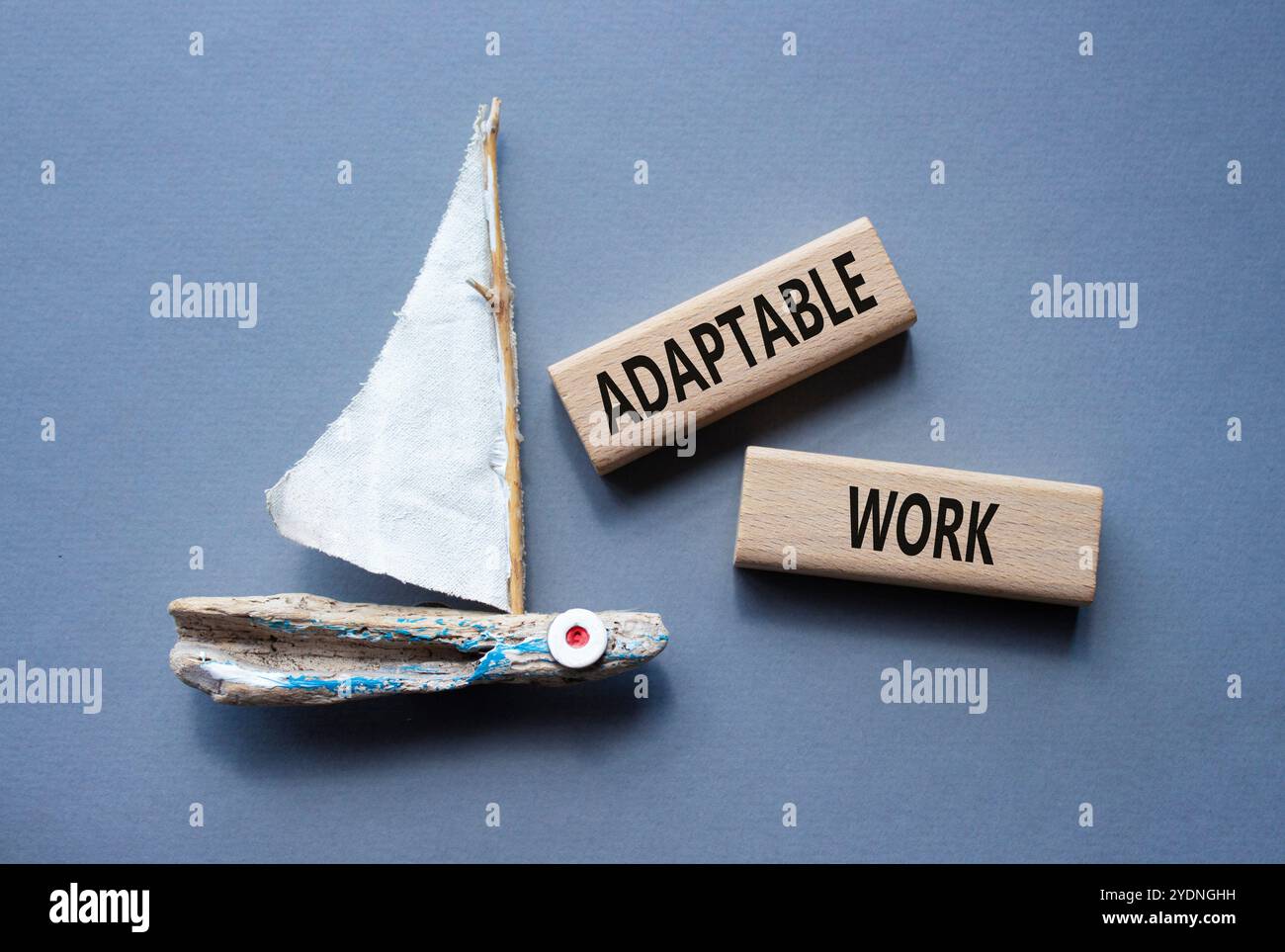 Adaptable work symbol. Concept word Adaptable work on wooden blocks ...