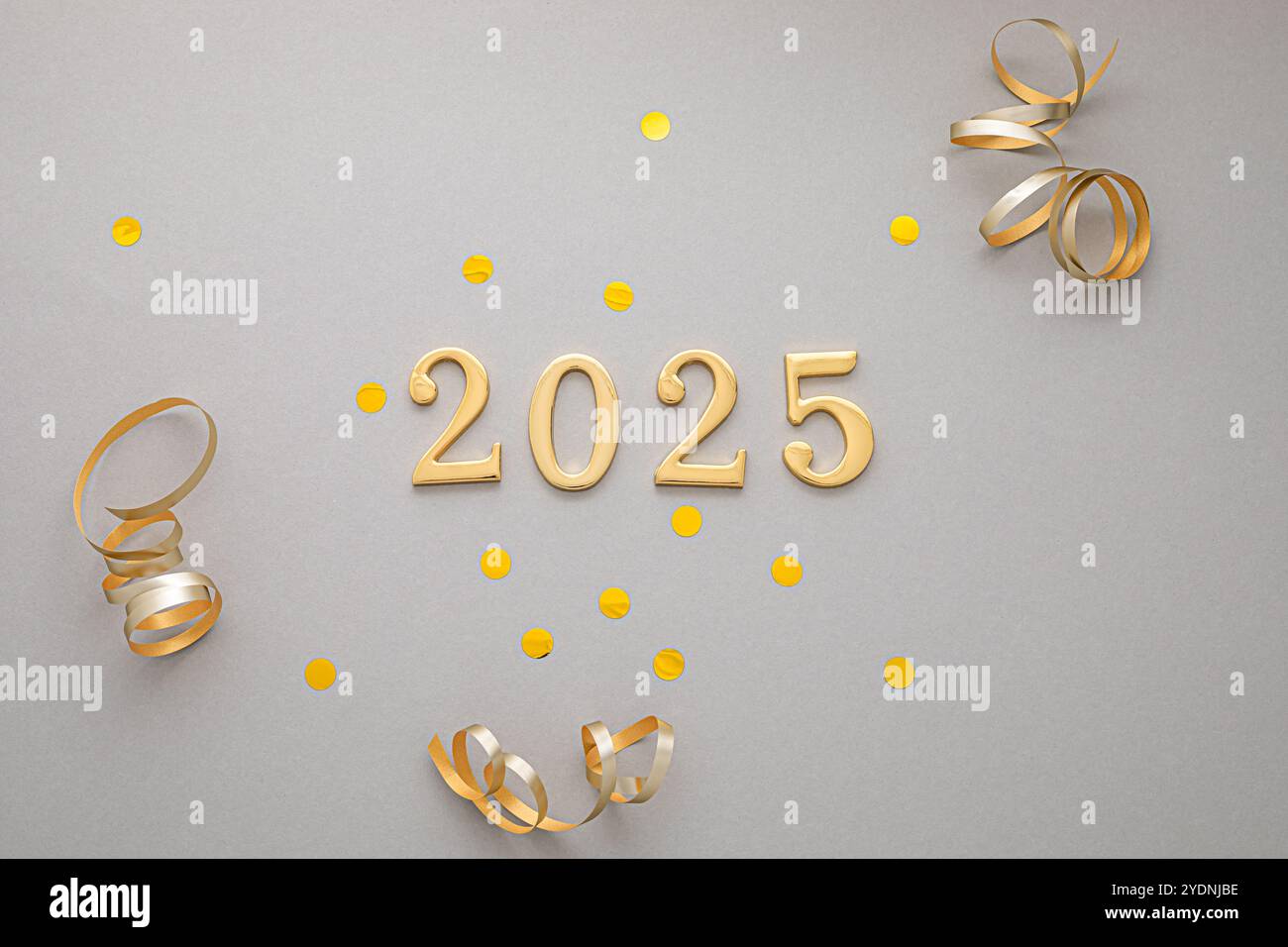 New year celebration setup featuring golden 2025 numbers and golden ...