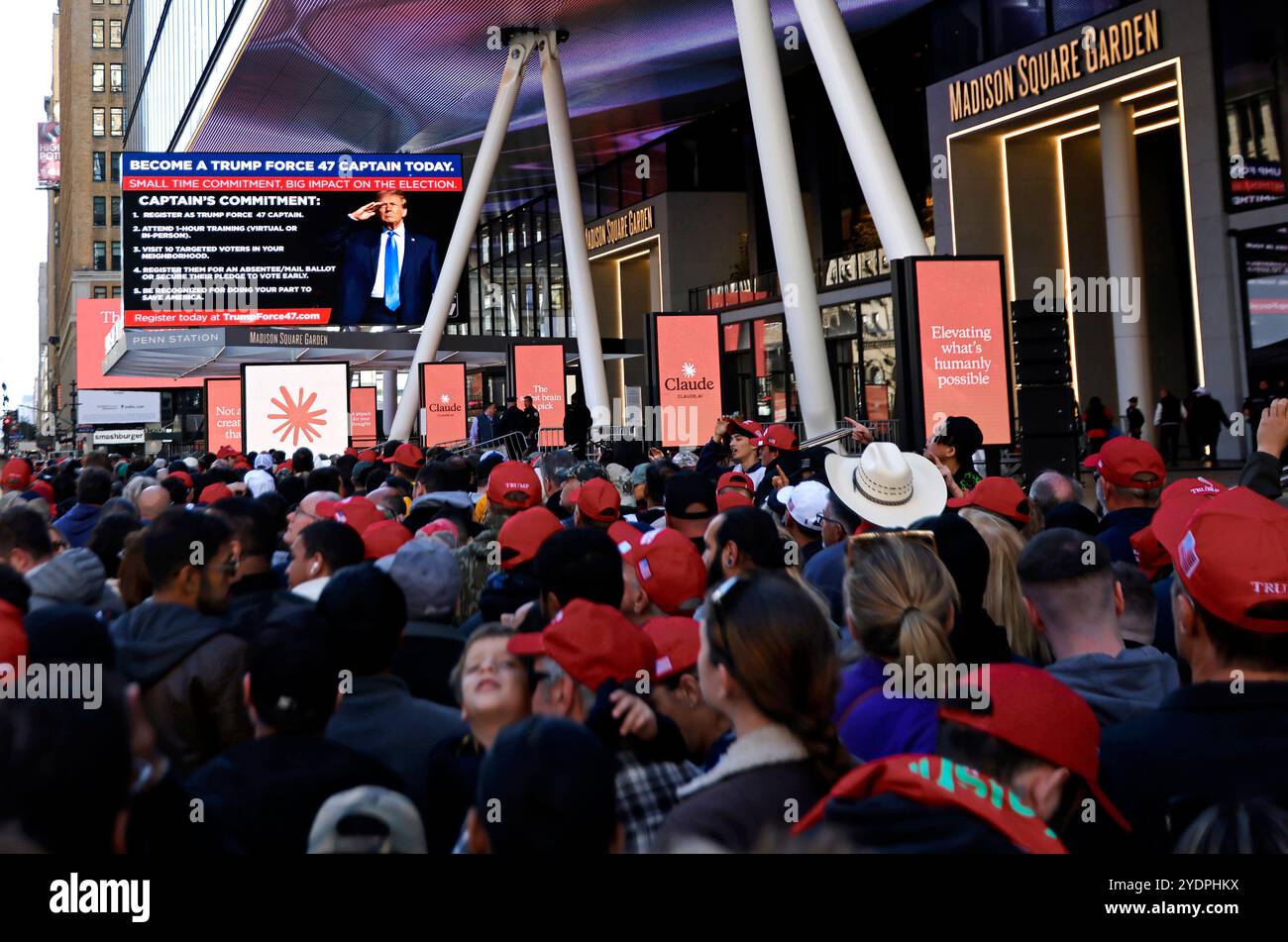 New York, United States. 27th Oct, 2024. Supporters wear Trump campaign ...