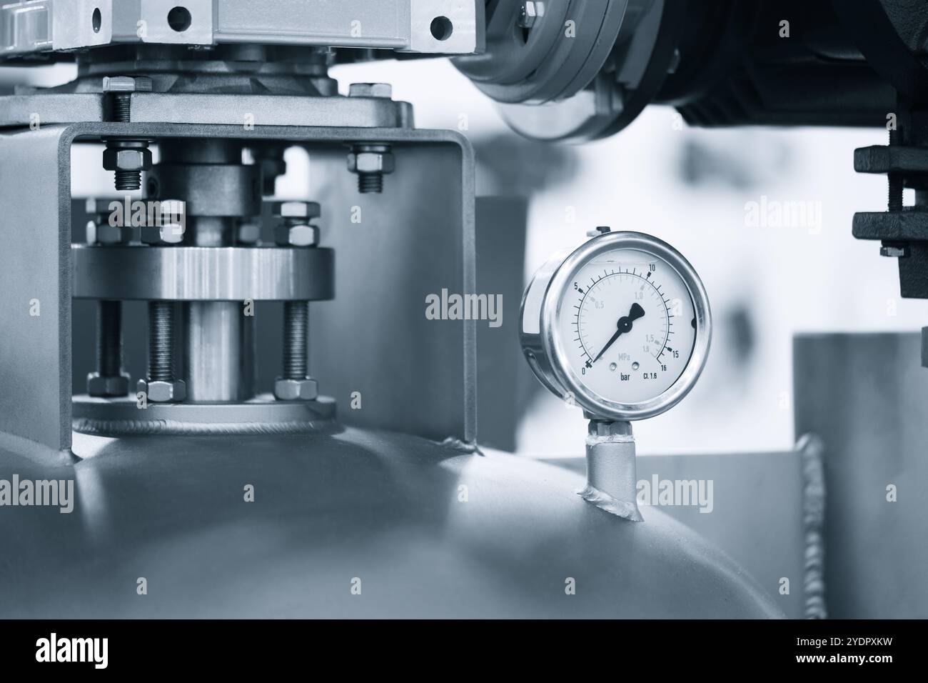 Pressure gauge attached to pipe, industrial chemical or pharmaceutical ...