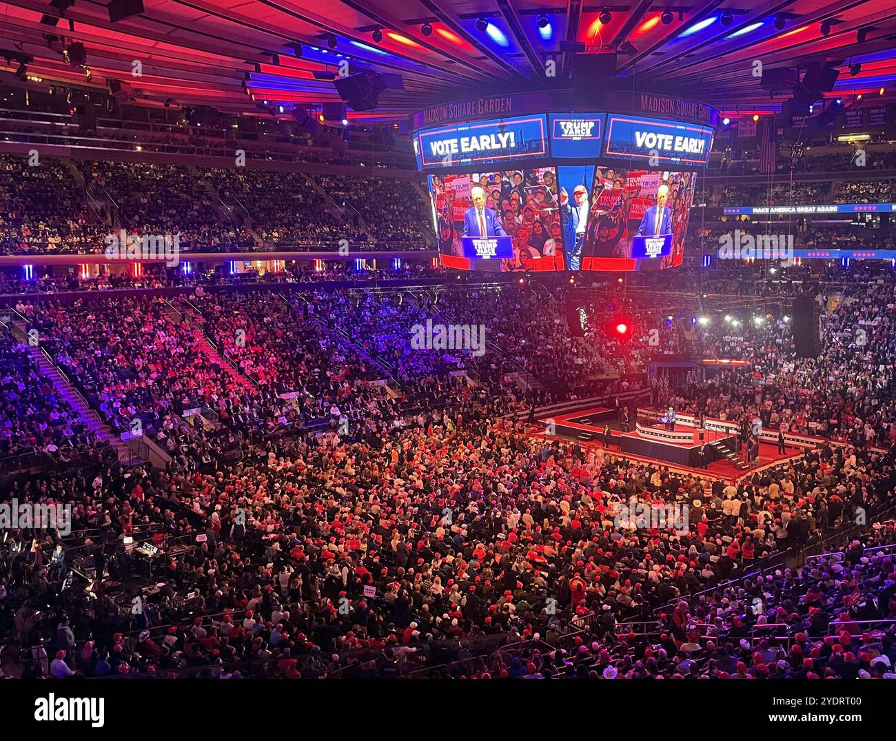 The photo shows a Republican rally where a large number of supporters ...