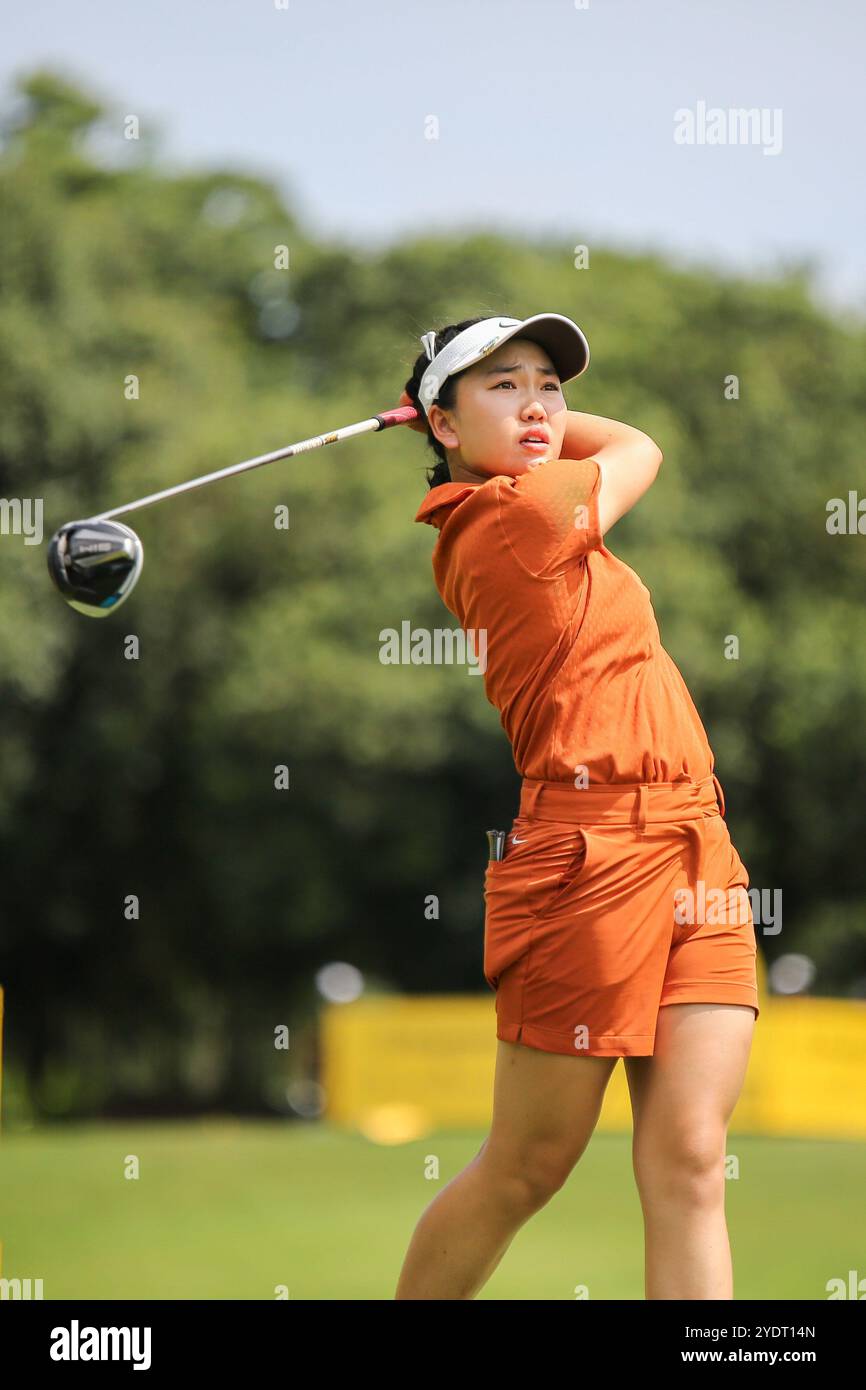 Kuala Lumpur, Malaysia. 27th Oct, 2024. Lucy Li of America plays her shot from the 13th tee during the final round of Maybank Championship 2024 on Kuala Lumpur Golf & Country Club golf course. Credit: SOPA Images Limited/Alamy Live News Stock Photo