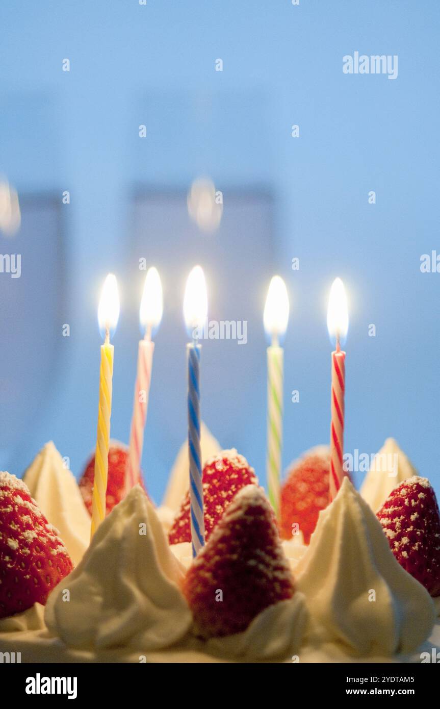 Birthday cake and candle flame Stock Photo