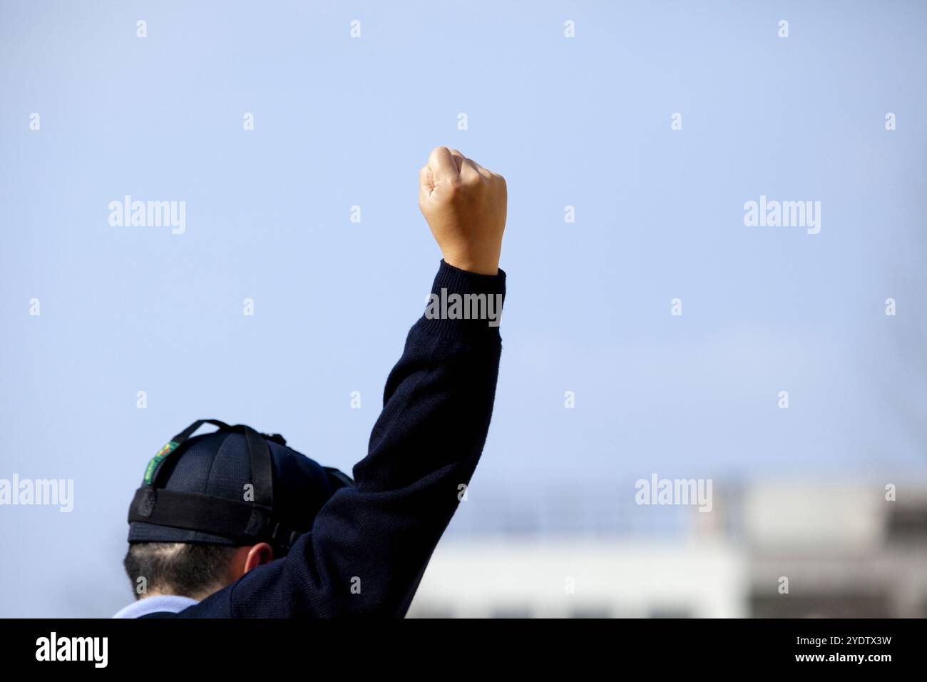 Baseball umpire calling a strike Stock Photo