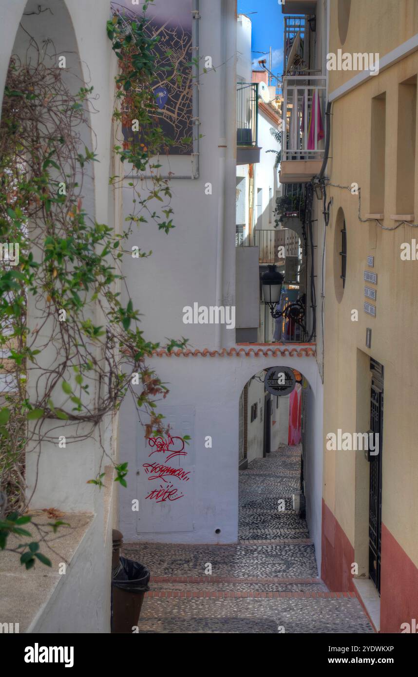 Traditional narrow streets in the old town of Benidorm on the Costa Blanca in Spain Stock Photo