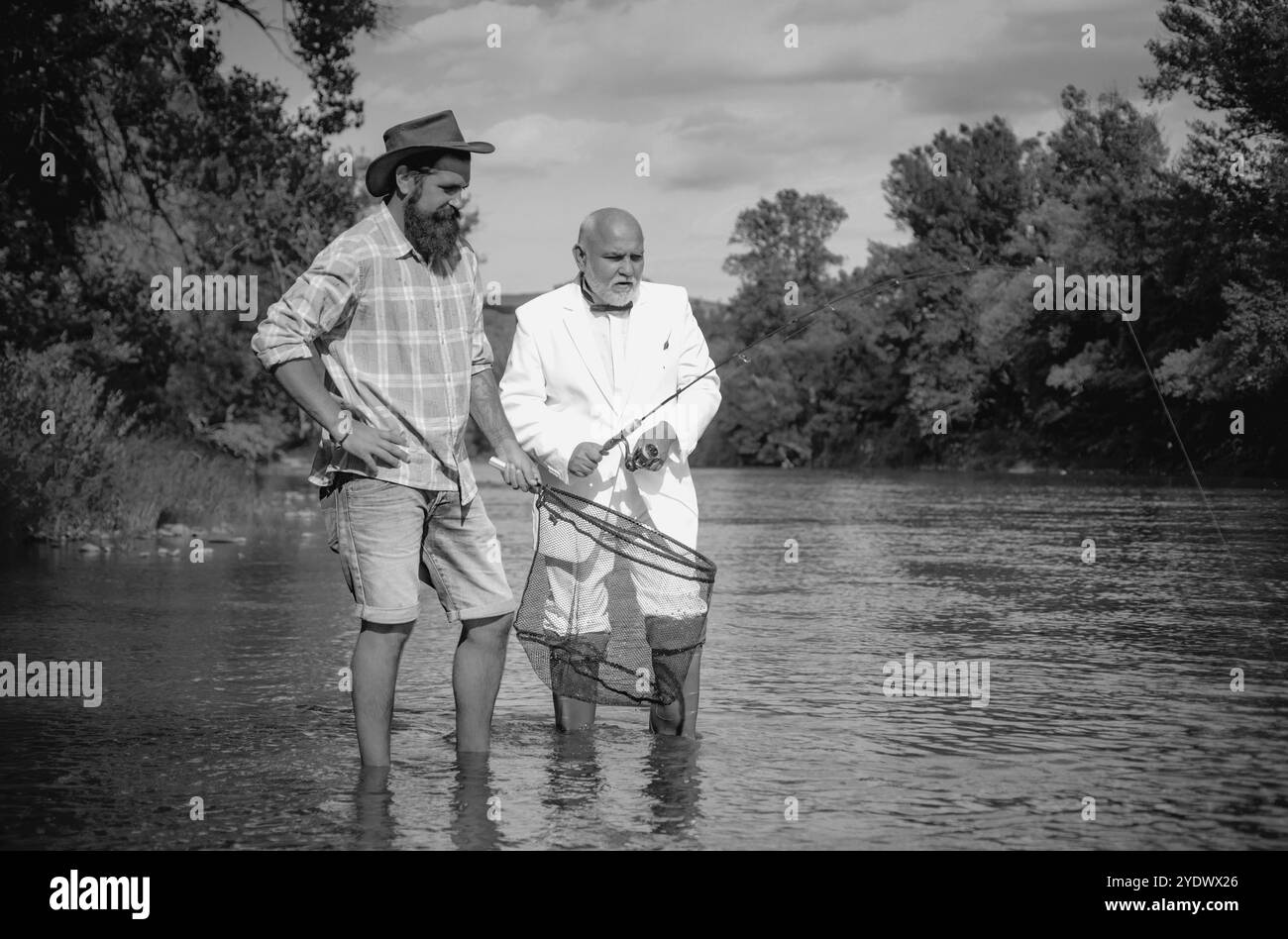 Grandpa fishing Black and White Stock Photos & Images - Alamy
