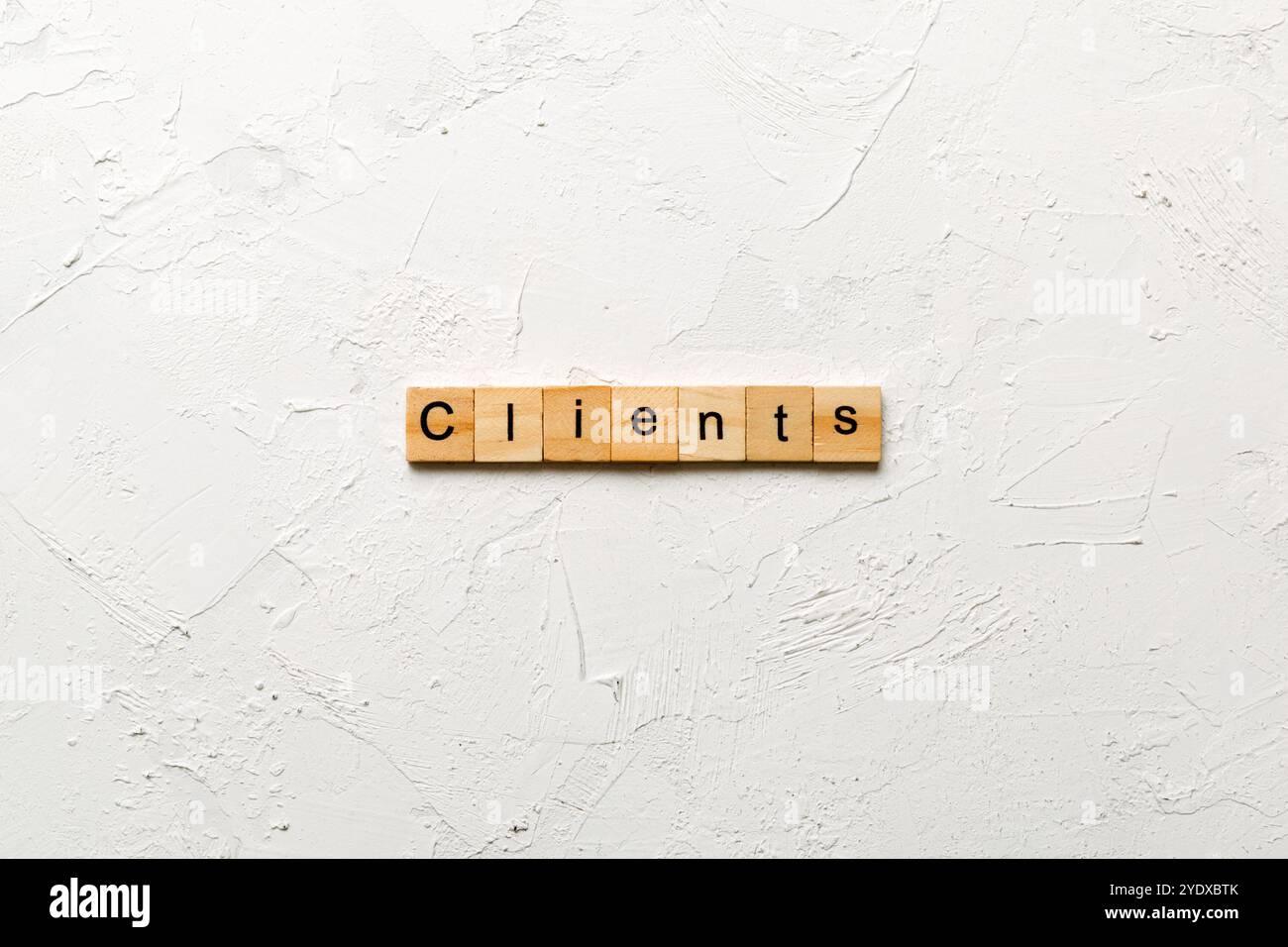 Clients word written on wood block. Clients text on table, concept. Stock Photo