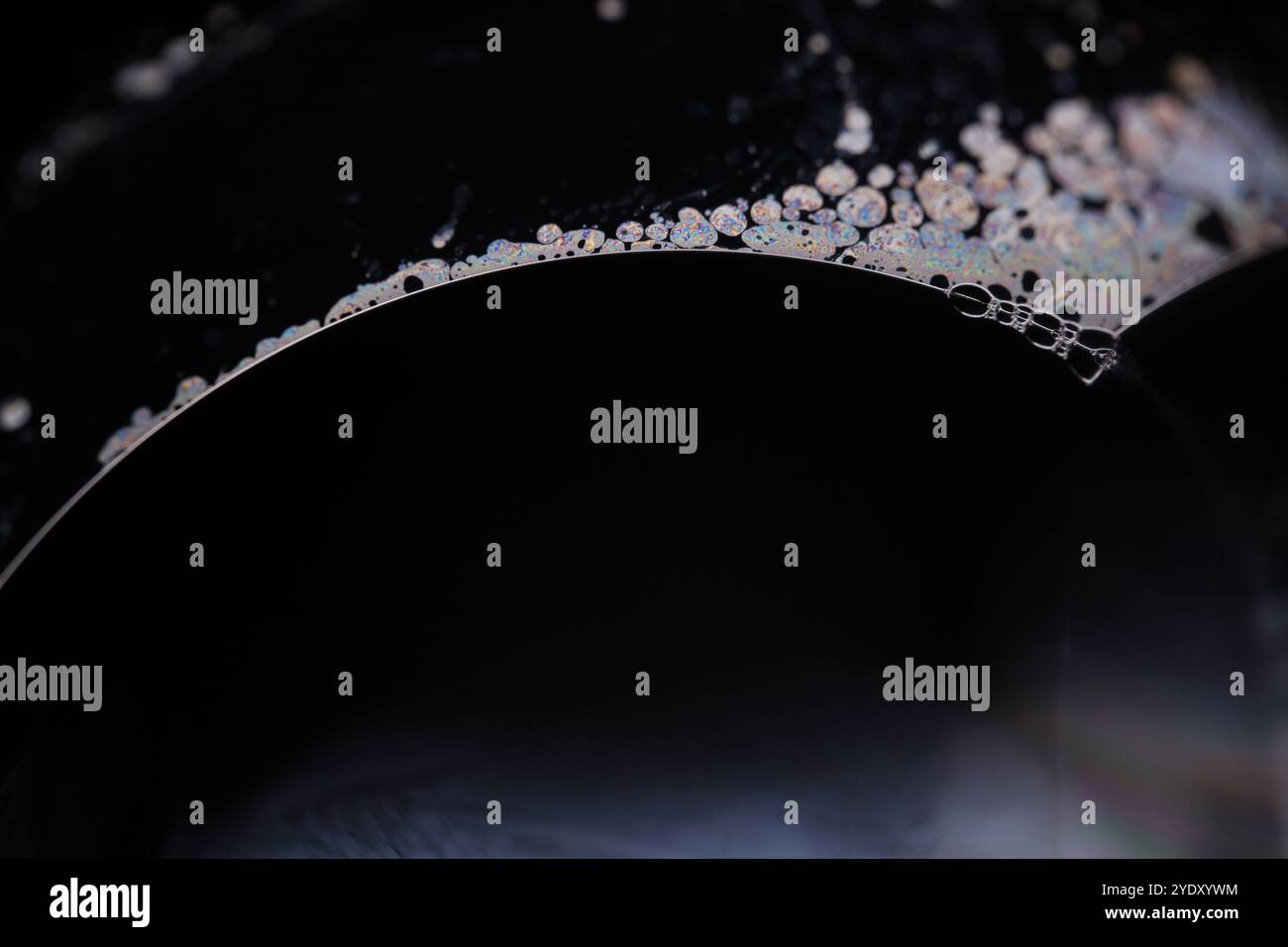 Silver liquid connections, bubble in macro, movement of liquid in a bubble, abstract background, copy space Stock Photo