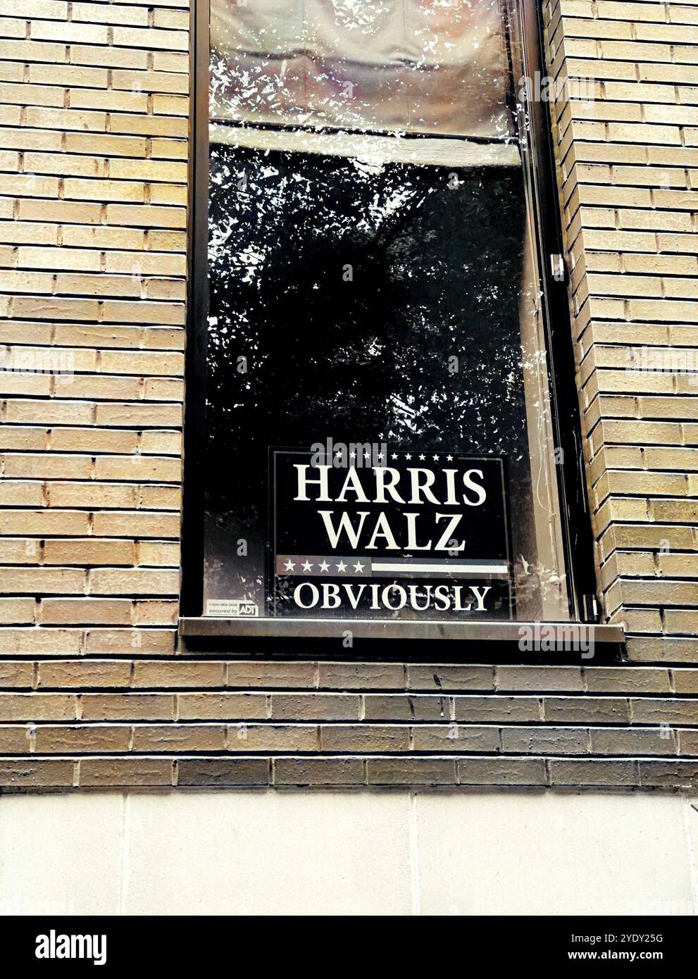 'Harris Walz Obviously' sign in an apartment building window in Cobble Hill, Brooklyn, N.Y.  September 27, 2024. - Smartphone Captured Stock Image 'Harris Walz Obviously' sign in an apartment building window in Cobble Hill, Brooklyn, N.Y.  September 27, 2024. - Smartphone Captured Stock Image