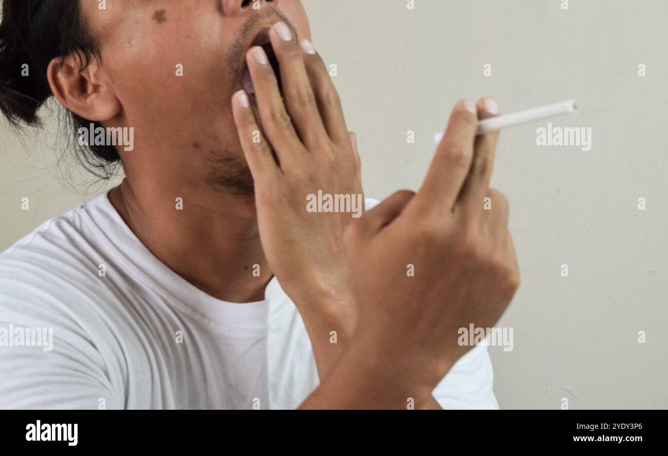 cigarette breath Man bad breath hi-res stock photography and images