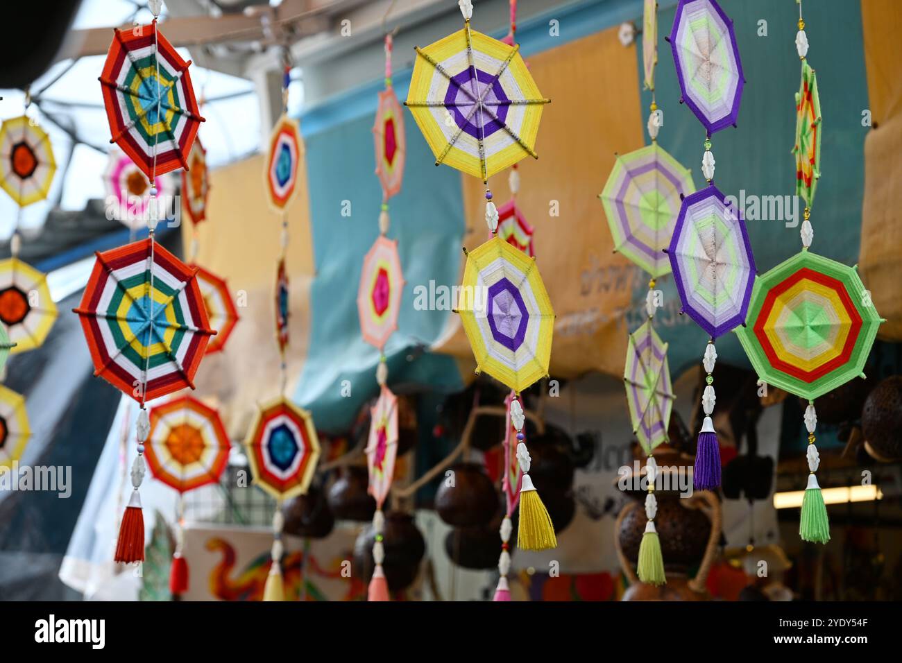 Beautiful and colorful Hangings yarn decorations selling  in mae Klong ,Railway market ,Thailand ,Bangkok, Asia Stock Photo