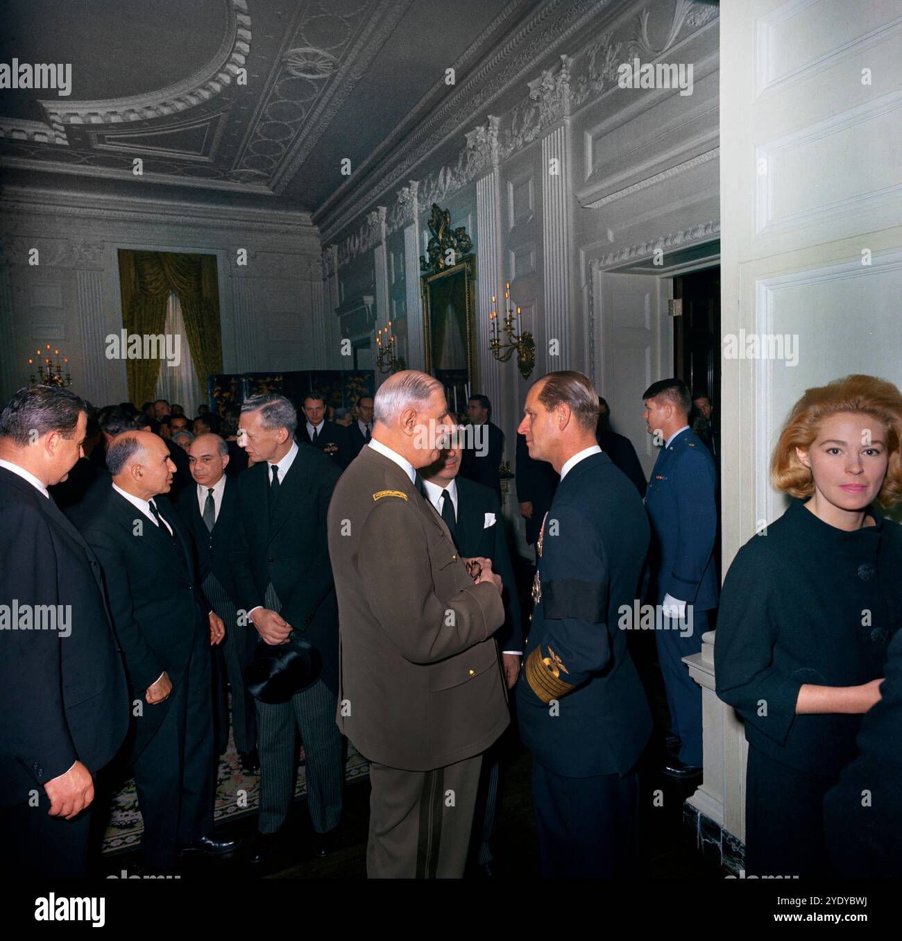 President of France, General Charles de Gaulle, visiting with Prince Philip, Duke of Edinburgh, during a reception at the White House, following the state funeral of U.S. President John F. Kennedy, Washington, D.C., USA, Cecil Stoughton, White House Photographs, November 25, 1963 Stock Photo