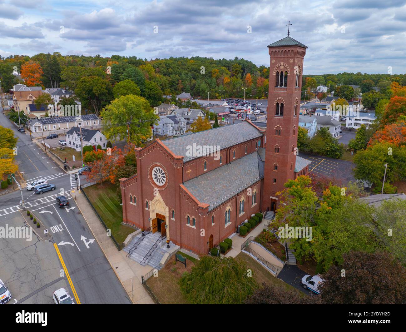 St Patrick Parish church aerial view at 1 Cross Street in fall with foliage in historic village of Whitinsville, town of Northbridge, Massachusetts MA Stock Photo