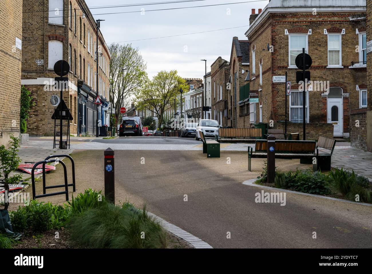 Rain gardens and benches double as traffic calming features in South London's Railton Road low traffic neighbourhood. Stock Photo