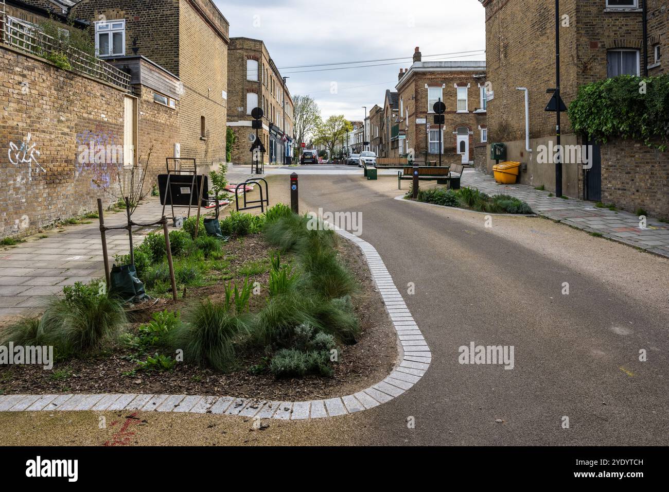 Rain gardens and benches double as traffic calming features in South London's Railton Road low traffic neighbourhood. Stock Photo