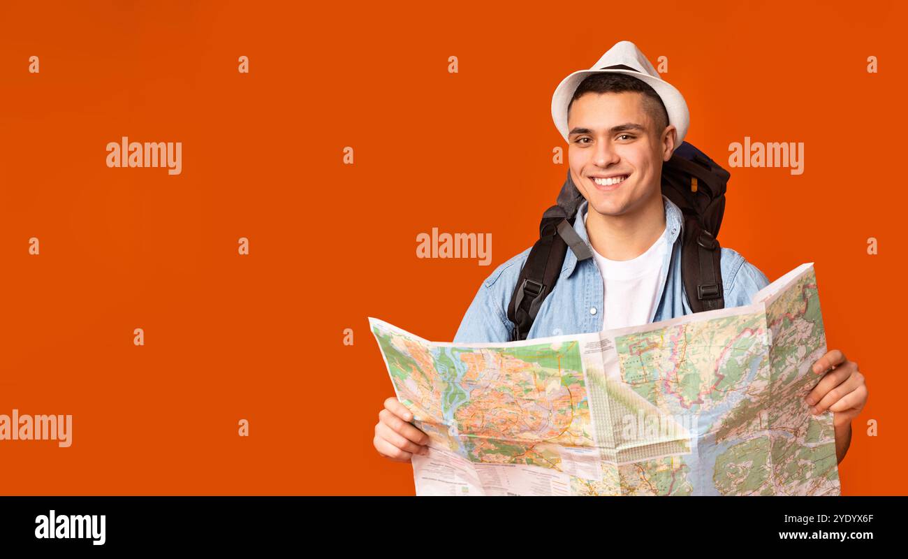 Adventure man map backpack in hi-res stock photography and images - Alamy
