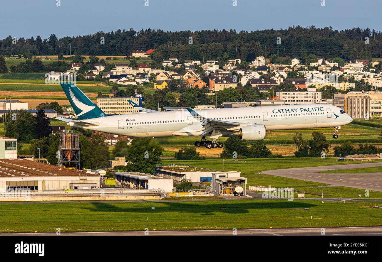 Zurich, Switzerland, 4th Aug 2024: A Cathay Pacific Airbus A350-1000 is on final approach to Zurich Airport. Registration B-LXK. (Photo by Andreas Haa Stock Photo