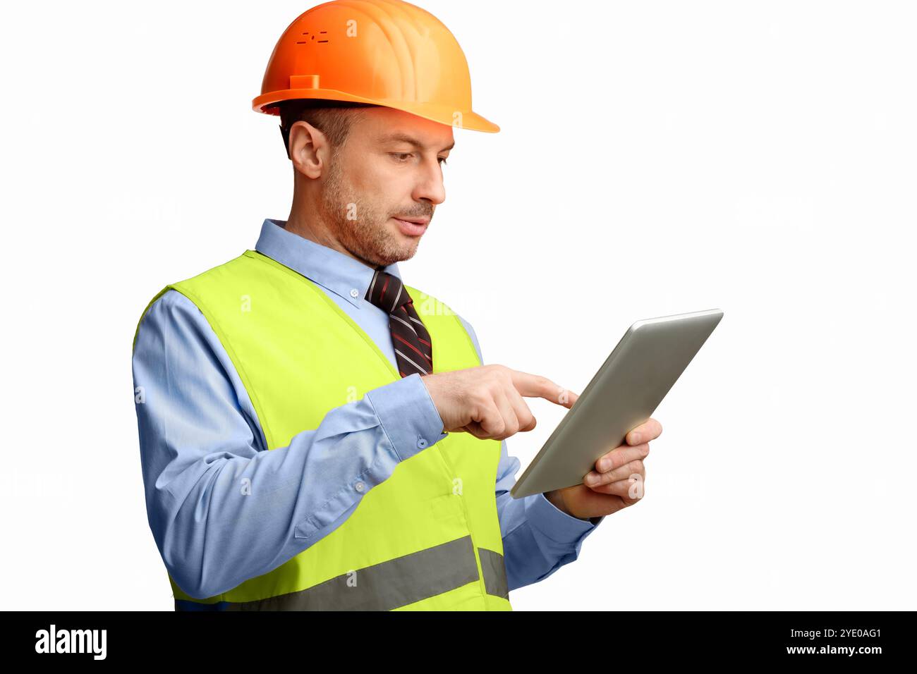 Building Engineer Using Digital Tablet Computer, Studio Shot Stock Photo