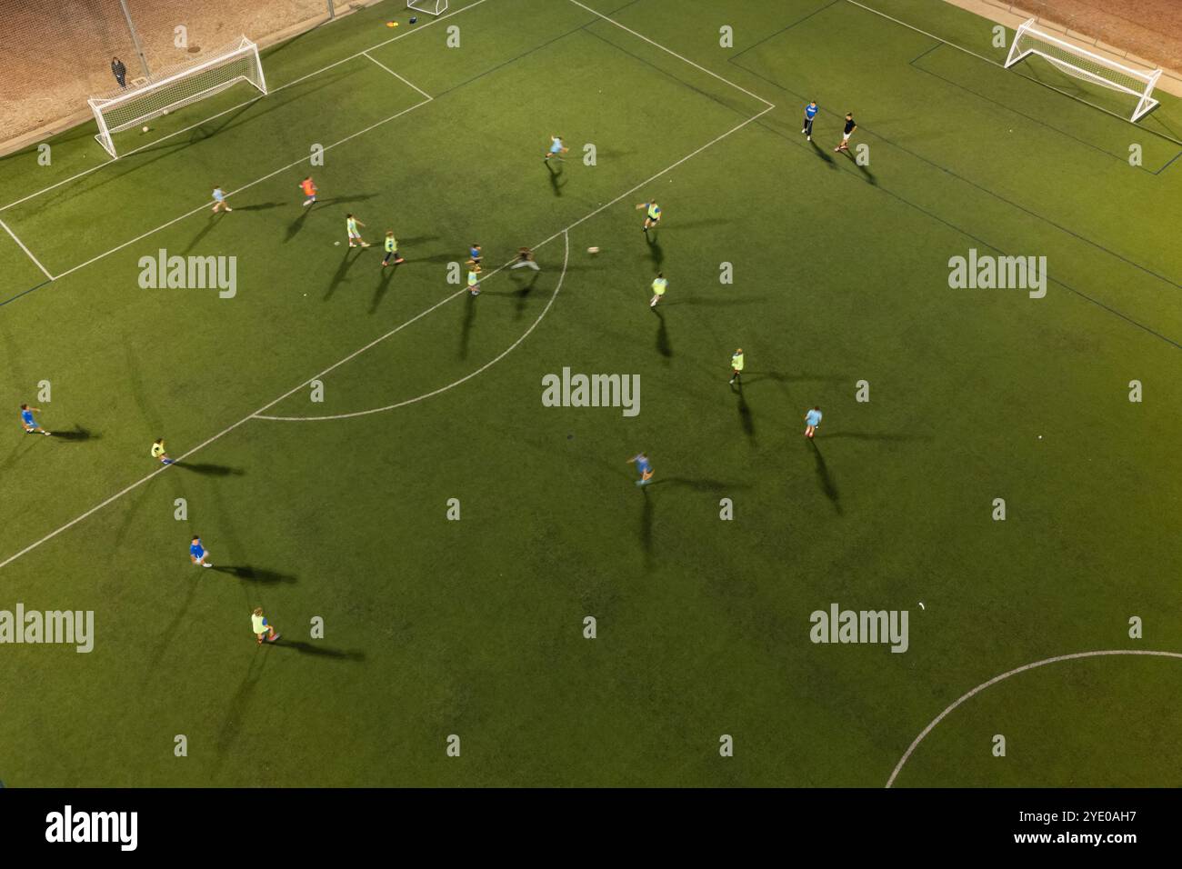 Aerial view of a training in a soccer field at night Stock Photo - Alamy