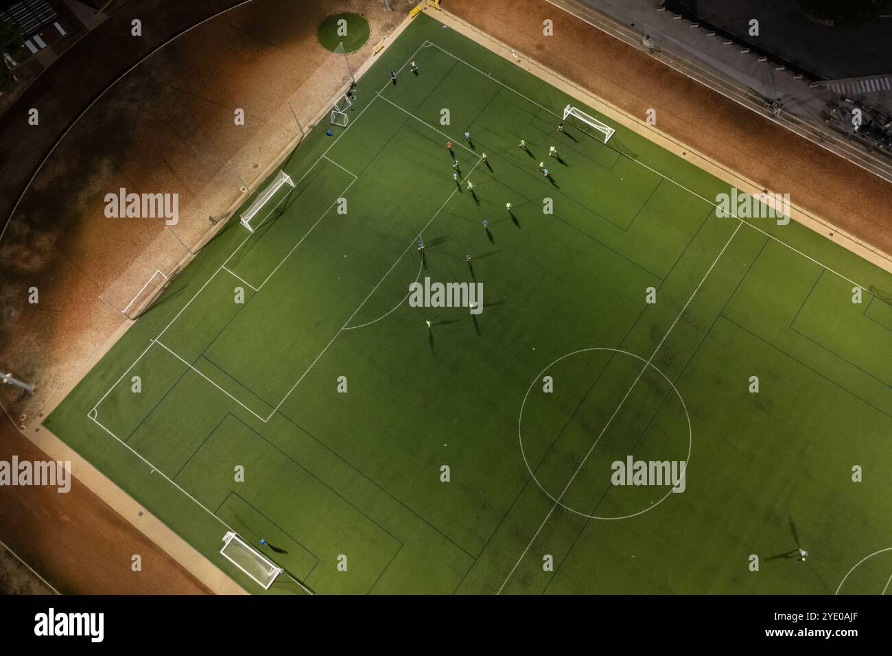 Aerial view of a training in a soccer field at night Stock Photo - Alamy
