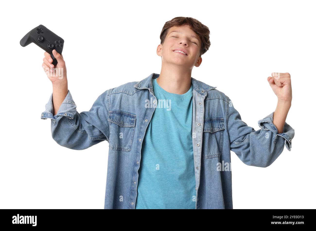 Happy teenage boy with controller on white background Stock Photo - Alamy