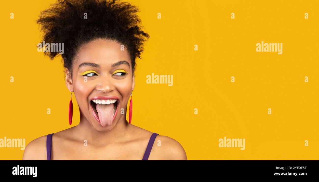 African girl sticking out tongue hi-res stock photography and images ...