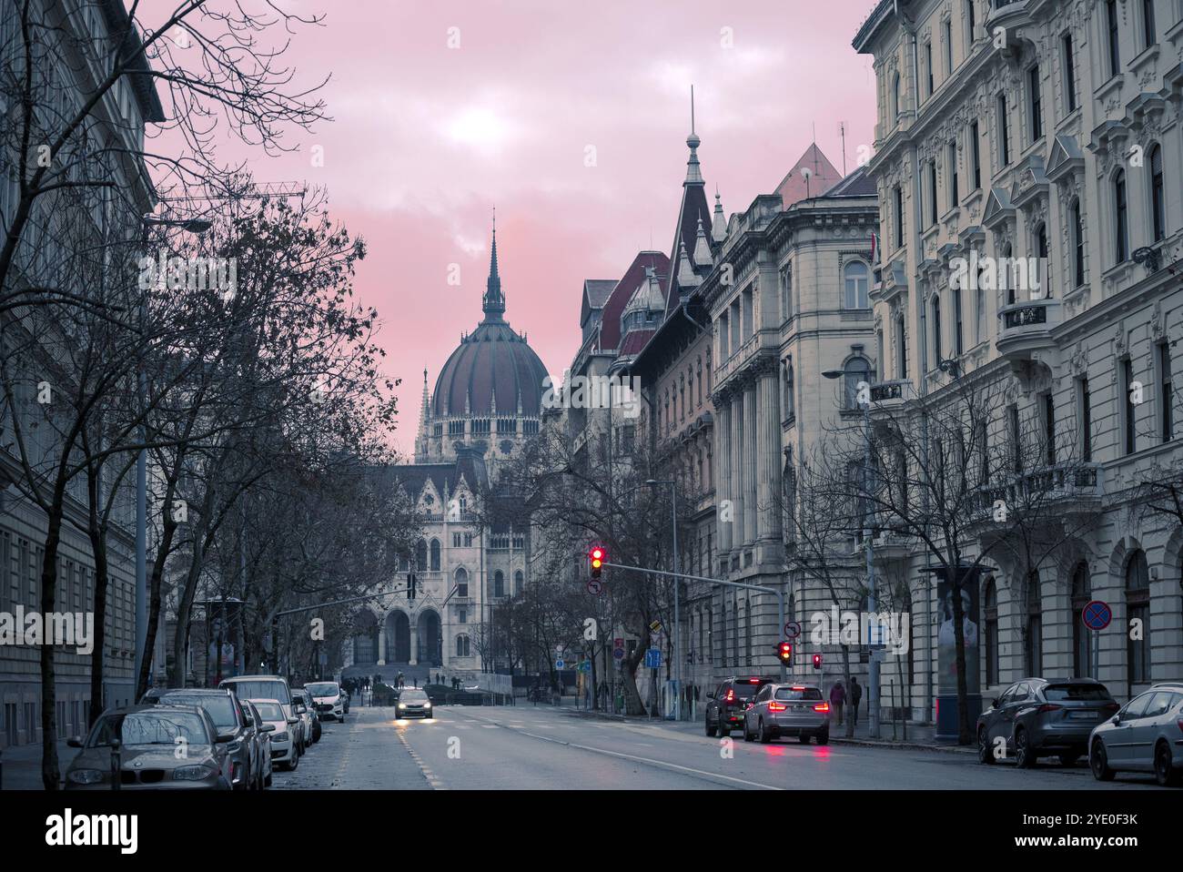 Alkotmány street view featuring Parliament dome Stock Photo