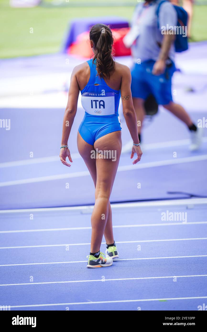 Dalia Kaddari participating in the 4x100 meters relay at the Paris 2024