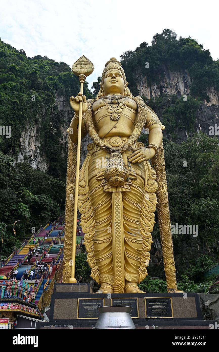 Close-up of the 140 ft Lord Murugan statue at the foot o…