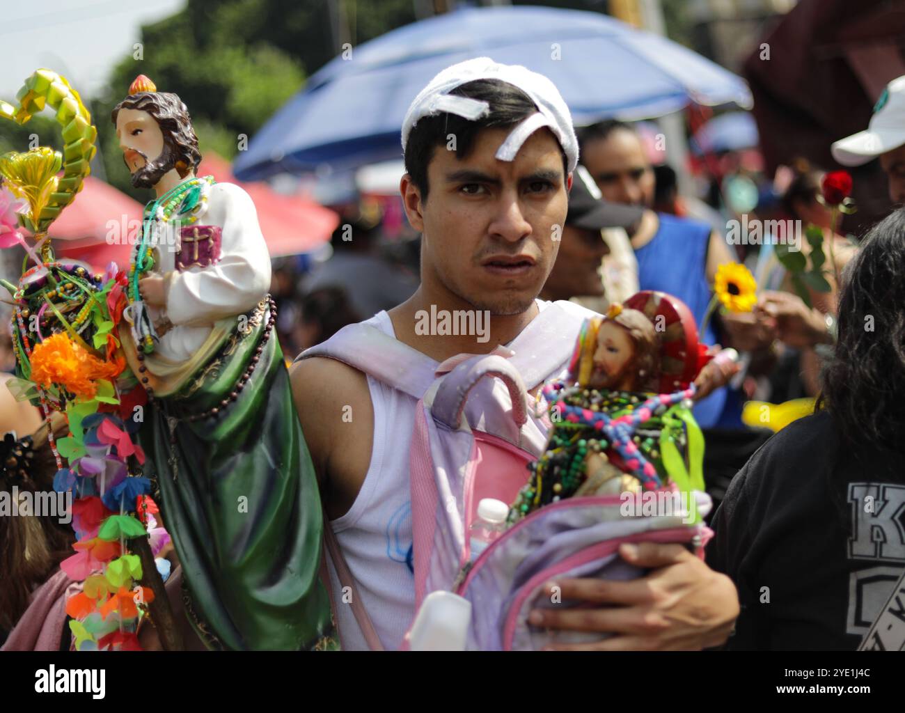 Mexico City, Mexico. 28th Oct, 2024. A Devotee of the Saint St. Jude Thaddeus, attends the Church of San Hipolito to bless the images and give thanks for the favors granted. on October 28, 2024 in Mecxico City, Mexico. (Photo by Ian Robles/ Eyepix Group/Sipa USA) Credit: Sipa USA/Alamy Live News Stock Photo