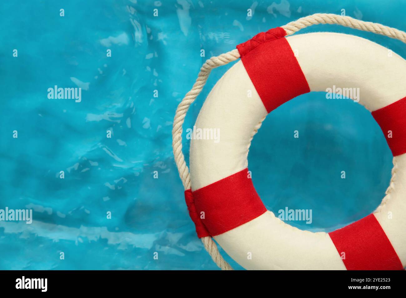 Floating buoy in blue water. Space for text Stock Photo - Alamy